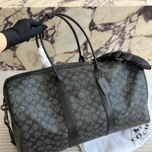 COACH canvas travel bag