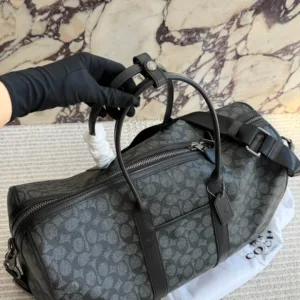 COACH canvas travel bag