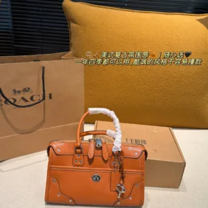 Coach Rhyder 24 oil wax leather tote hand bags