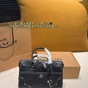 Coach Rhyder 24 oil wax leather tote hand bags