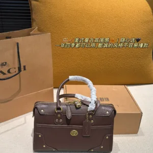 Coach Rhyder 24 oil wax leather tote hand bags