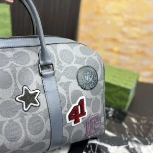 COACH’s new Venturer badge travel bags