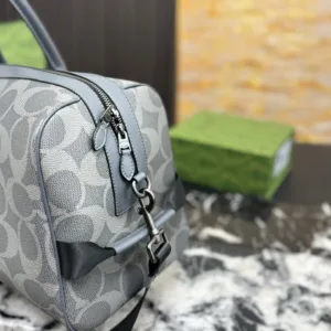 COACH’s new Venturer badge travel bags