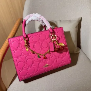 Coach Maggie's embossed tote hand bags
