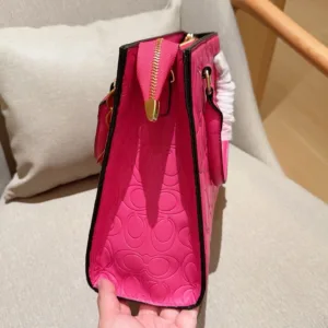 Coach Maggie’s embossed tote hand bags