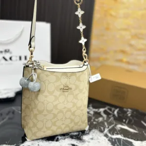 Coach’s latest Mollie bucket tote hand bags