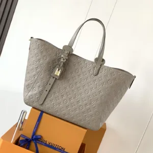 M25889 All In One MM Empreinte Leather Handbags