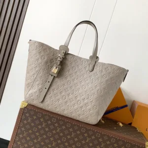 M25889 All In One MM Empreinte Leather Handbags