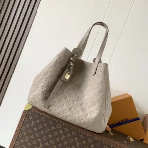 M25889 All In One MM Empreinte Leather Handbags