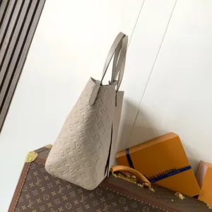 M25889 All In One MM Empreinte Leather Handbags