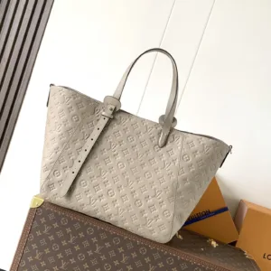 M25889 All In One MM Empreinte Leather Handbags