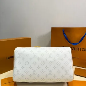 Louis Vuitton Speedy 30 handbag in multiple colors