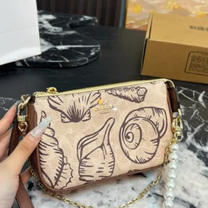 Coach nolita19 Mahjong shaped handbag