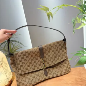 Gucci Supreme denim shoulder bags