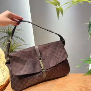 Gucci Supreme denim shoulder bags