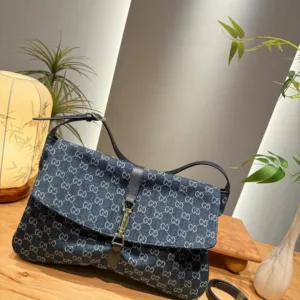 Gucci Supreme denim shoulder bags