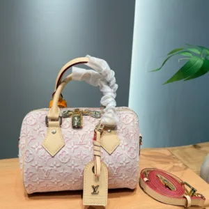 Louis Vuitton embossed embroidered pillow handbags
