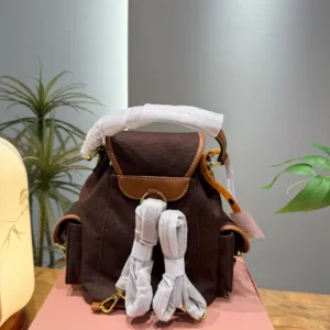 MiuMiu brown black white denim backpack