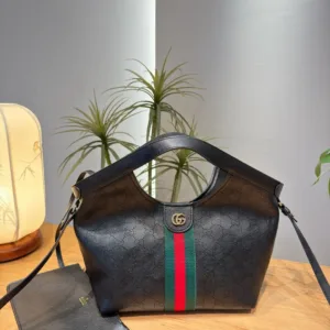 Gucci black perforated leather underarm bag