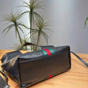Gucci black perforated leather underarm bag