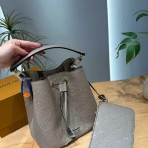 Louis Vuitton champagne bucket ToTe handbags