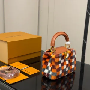 L&V Capucines Taurillon Tote Hand Bags
